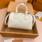 LV Speedy Bandouliere 20 Monogram Empreinte cowhide leather Milky white blue