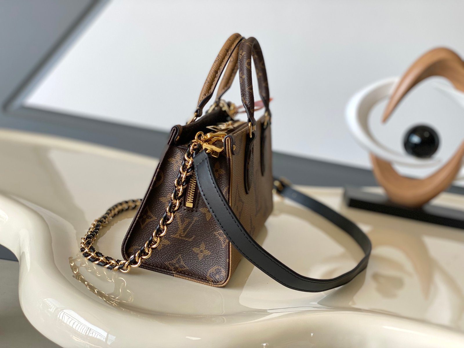 LV OnTheGo East West Monogram Reverse - Image 9