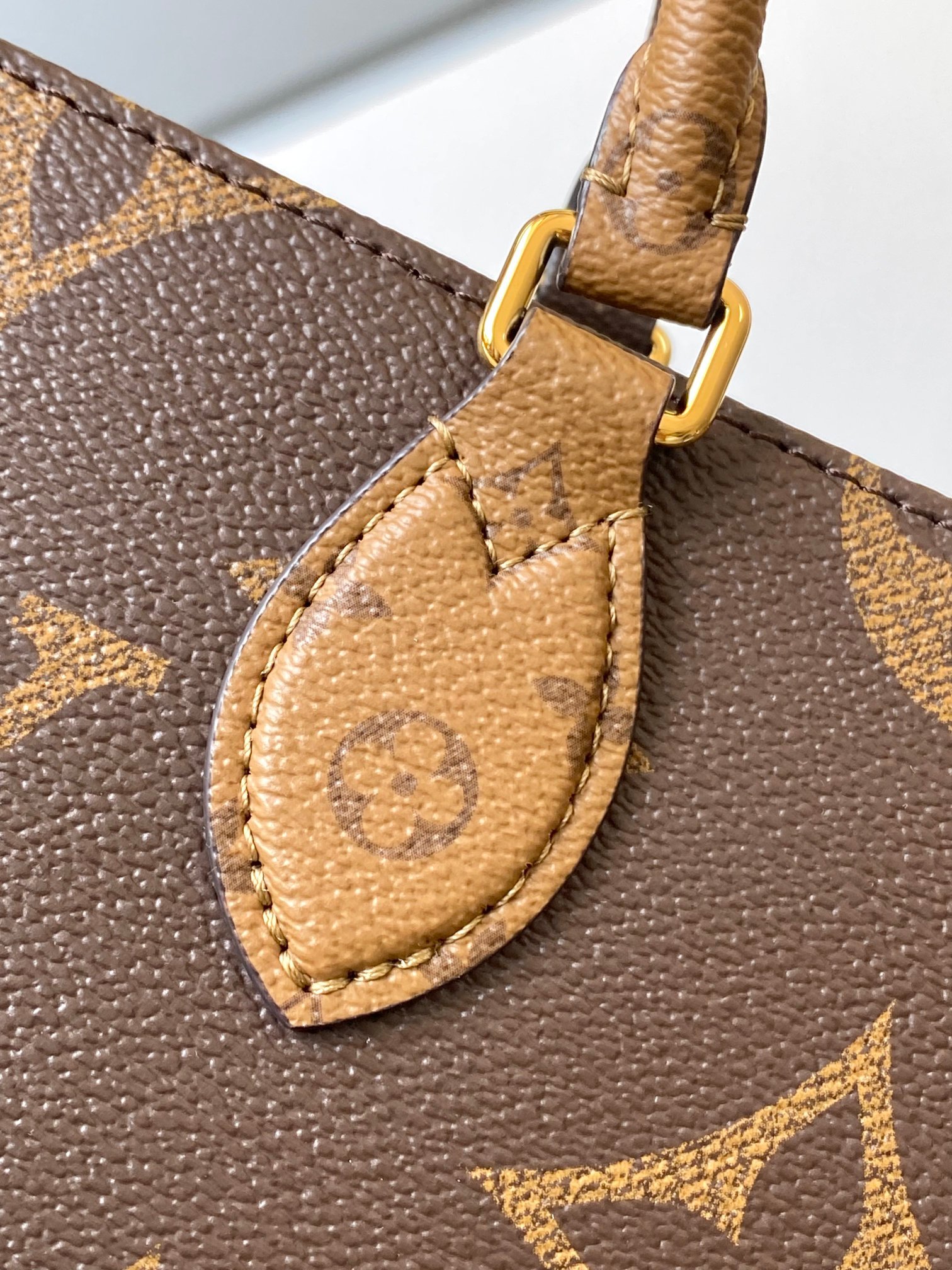 LV OnTheGo East West Monogram Reverse - Image 6
