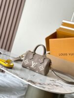 LV Nano Speedy Bandouliere Taupe Monogram Empreinte with white letters