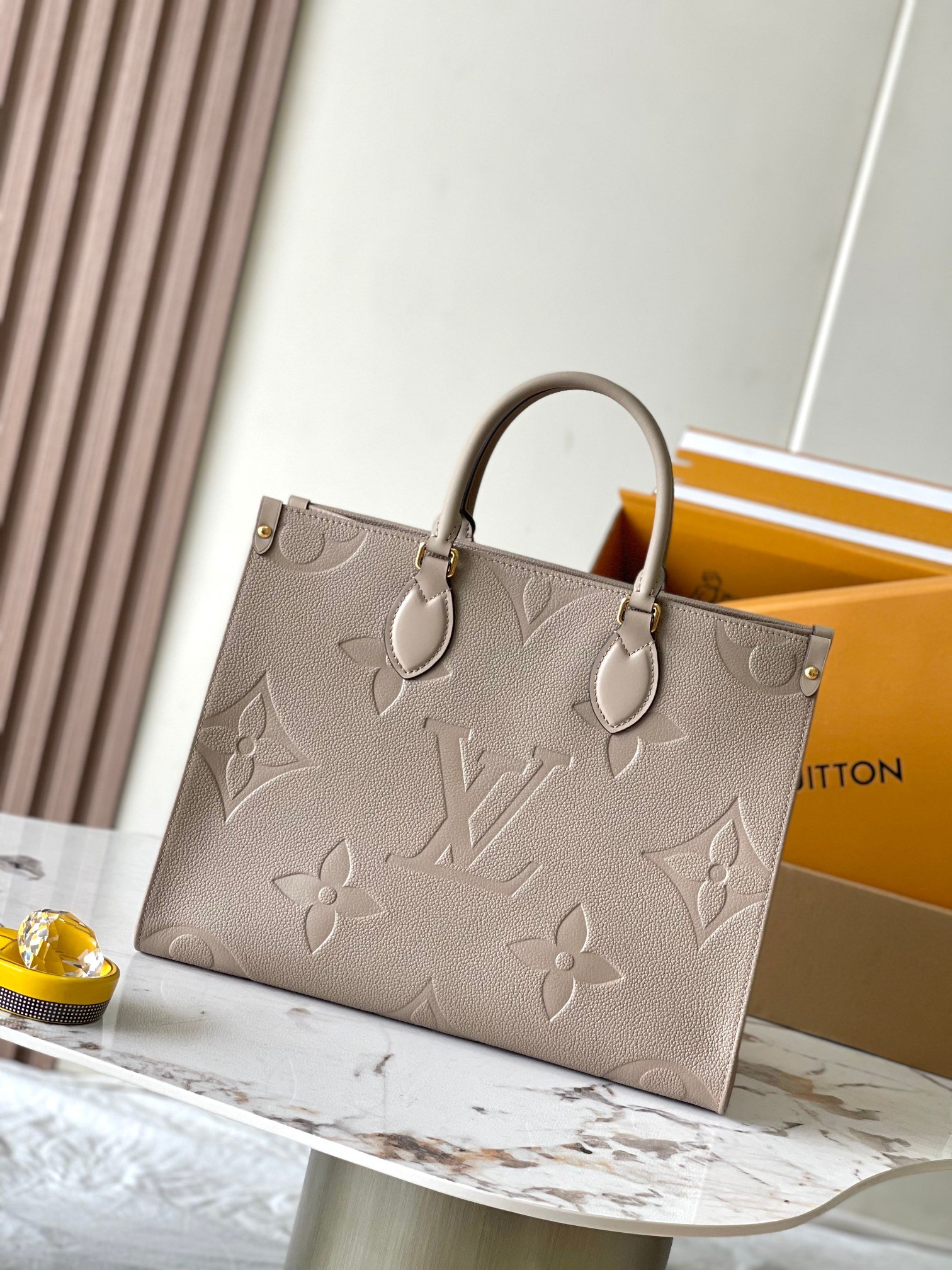 LV OnTheGo MM Monogram Empreinte Cowhide